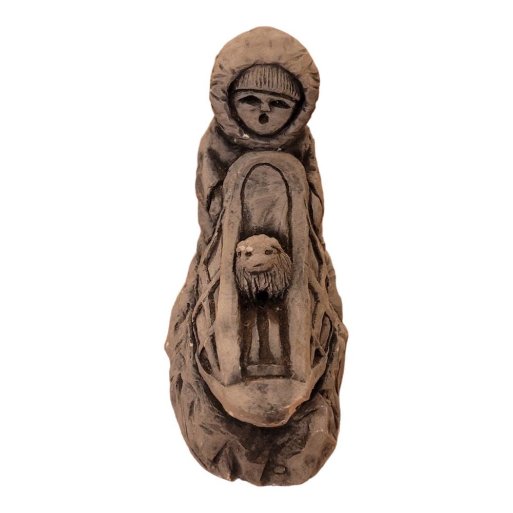 Vintage dogsled figurine